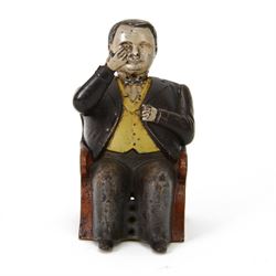 Late 19th century American cast iron Tammany mechanical money box, modelled as a suited ge...