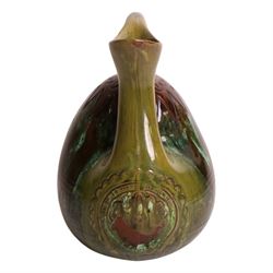 Dr Christopher Dresser - Linthorpe pottery hump back water jug with incised and green glazed decoration and loop handle, facsimile signature and numbered 347 H17cm