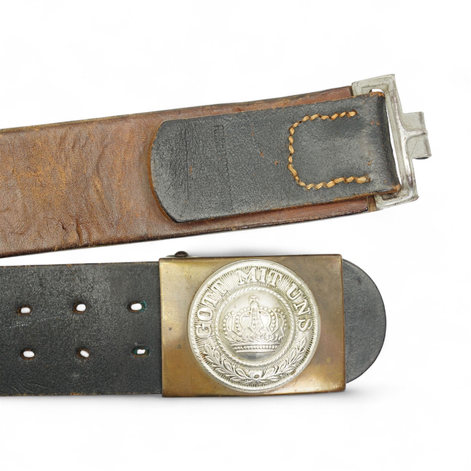 German WWI leather belt, the buckle marked 'Gott Mit Uns' surrounding a crown, a Third Reich webbing belt and buckle encircling eagle and swastika, NSDAP arm band and another