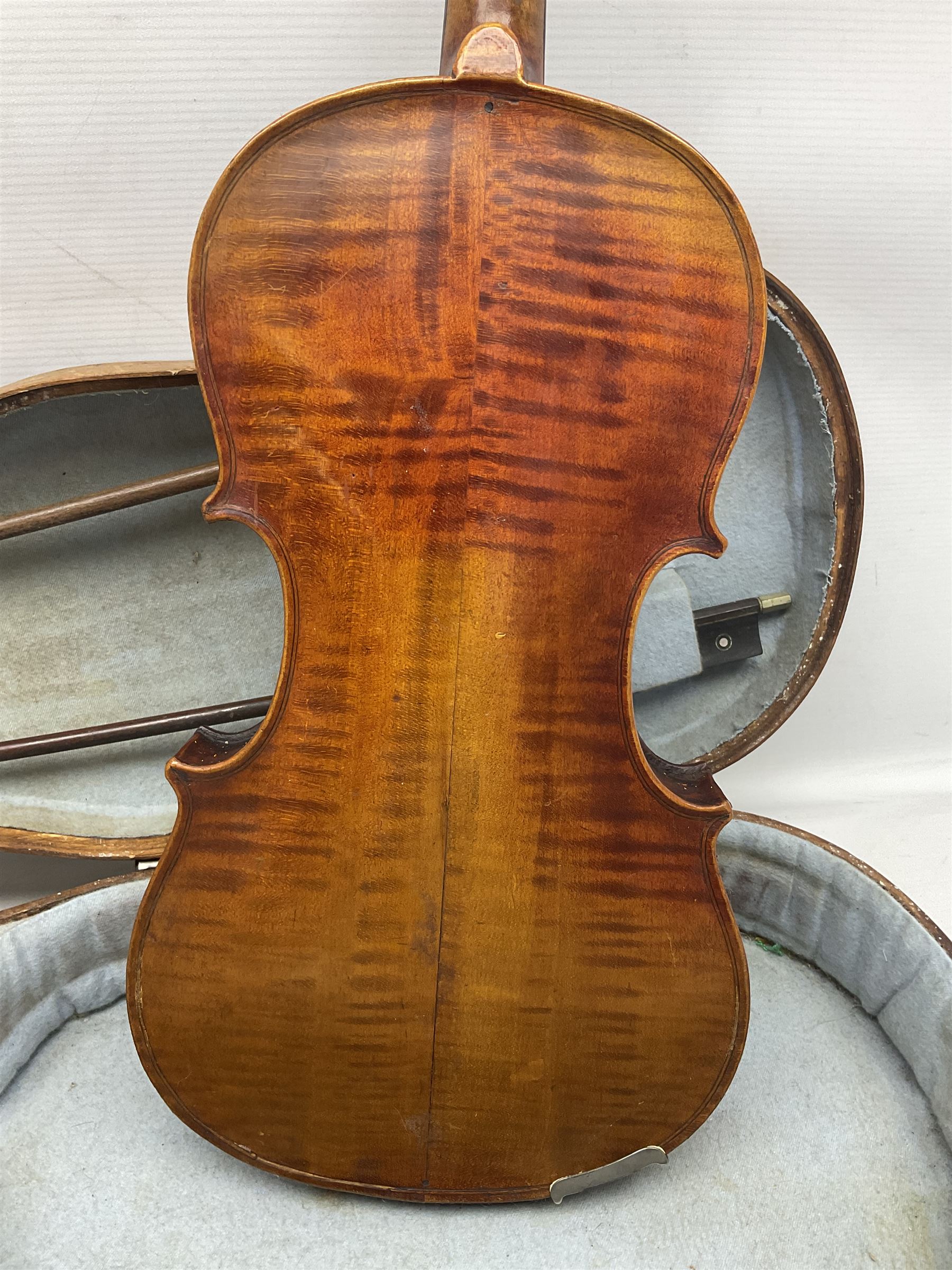 Mid-19th century German violin with 36cm two-piece maple back and ribs and spruce top, bears label 'Riccardo Antoniazzi Cremonese fece in Milano l'anno 1896' L59.5cm overall; in walnut case with two part bows