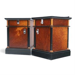 Pair of Art Deco design burr walnut and ebonised bedside cabinets, rectangular inset tops with raised rear galleries, each fitted with a drawer above a cupboard, flanked by cylindrical columns, on plinth bases