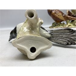 Three Beswick figures of birds, comprising pheasant no 1225, magpie no 2305 and woodpecker 1218, all with impressed marks beneath, tallest H22cm