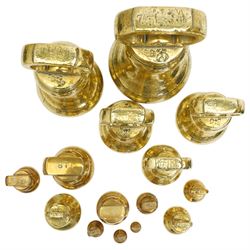 Group of fifteen brass bell weights 1/4oz-7ibs mostly Victorian, some marked with a sheep in a sling, possibly the mark for Holmfirth and a set of Libra scales with a set of graduated brass flat weights