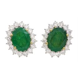 Pair of 18ct gold oval emerald and round brilliant cut diamond cluster stud earrings, stamped 750, total emerald weight approx 5.80 carat, total diamond weight approx 2.00 carat