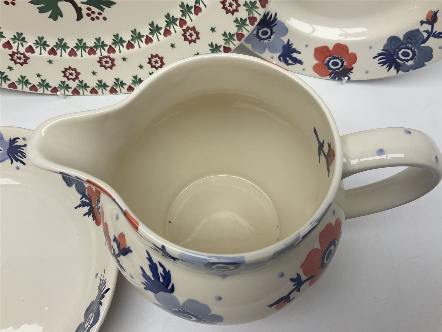 Emma Bridgewater ceramics, to include Christmas Joy Robin pattern meat platter, serving plate, bowl and two mugs, Anenome pattern jug, dinner plate, mug and three bowls, polka dot pasta bowl and two Wallflower pattern pasta bowls, largest D33.5cm