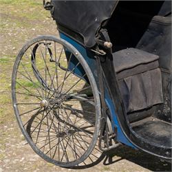 Victorian Bath Chair / Invalid Carriage Converted for Horse Drawn Use

A Victorian bath chair or invalid carriage, later converted for horse drawn use, with black painted bodywork, blue side panels, folding black leather hood and upholstered single passenger seat. The carriage is fitted with large rear wire spoked wheels, smaller front steering wheels, long shafts, footwell and curved body sides, consistent with a late nineteenth century invalid carriage or bath chair form adapted for pony or light horse use.

Features

Bath chair or invalid carriage form
Later converted for horse drawn use
Folding black leather hood
Single upholstered passenger seat
Deep footwell
Black painted body with blue side panels
Large rear wire spoked wheels
Smaller front steering wheels
Long shafts
Lightweight carriage frame

Dimensions:
Overall length: 380 cm
Body length: 204 cm
Width: 88 cm
Height: 178 cm

Wheel Diameters:
Front wheels: 47 cm
Rear wheels: 88 cm

Seating:
Driver: 1
Passenger: None