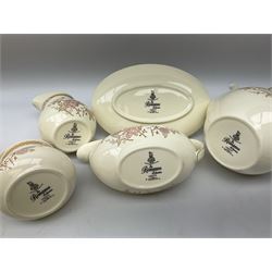 Royal Doulton ‘The Romance Collection’ dinner service decorated in the ‘Lisette’ pattern for six, to include lidded tureens, dinner plates, sauce boat and stand, coffee pot, coffee cups, bowls, lidded sucrier etc