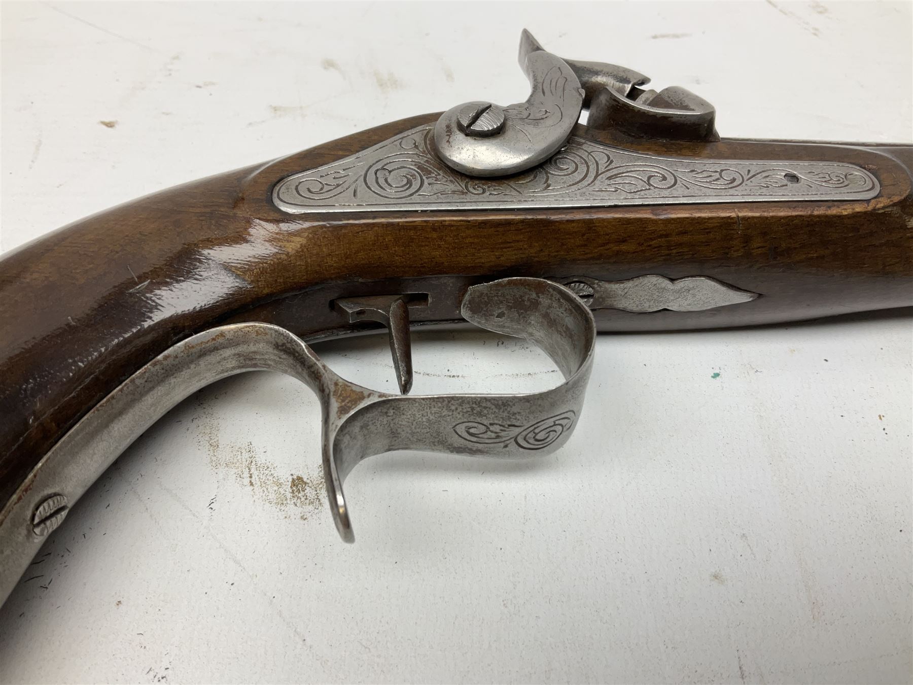 SECTION 1 FIREARMS CERTIFICATE REQUIRED OR REGISTERED FIREARMS DEALER - Pair of Reproduction Continental .44 calibre percussion target pistols, each with heavy 23.5cm octagonal to round barrel bearing various marks, crude scroll engraving to lock plate, hammer and octagonal section of barrel, unchequered walnut stock with brass butt plate and steel hooked trigger guard, numbered 8138 & 8164, L41.5cm overall; in maroon baize lined converted sapele mahogany fitted case bearing reproduction trade label for Trulock & Son Dublin containing small copper powder flask, steel scissor action bullet mould, nipple key, turned wooden mallet and lidded box, steel rammer and wooden cleaning rod, case L48cm