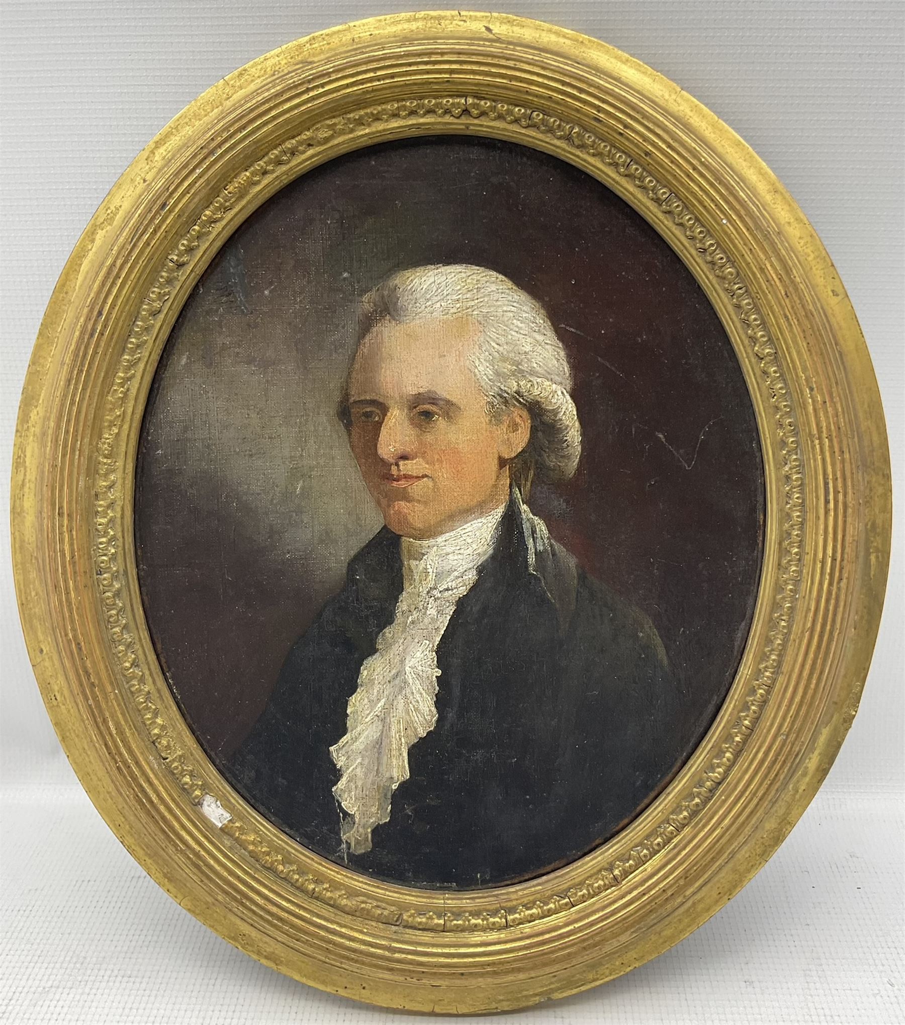 English School (Early 19th century): Portrait of a Professional Gentleman, oval oil on canvas unsigned 29cm x 24cm
