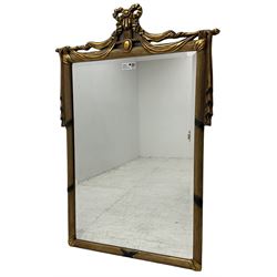 Regency design gilt framed wall mirror, ribbon pediment over hanging linen swags, bevelled mirror plate enclosed by reed moulded frame 