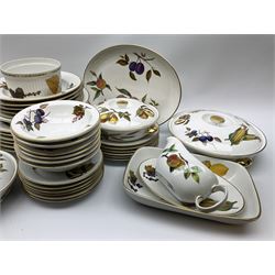 Royal Worcester Evesham dinner service including dinner plates, bowls and side plates all sets of six, five soup bowls, gravy boat and dish, four serving dishes with lids,  one platter, two serving dishes, two jars with lids and two other dishes. 