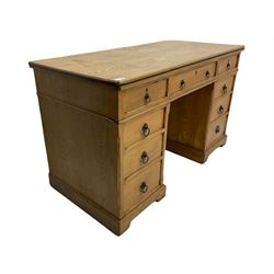 Late Victorian ash twin pedestal dressing table/desk, fitted with nine drawers, the centre drawer stamped 