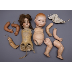  Kley Hahn 'Walkure' bisque head doll with applied hair, sleeping eyes, open mouth with teeth and composition body with detached jointed limbs (one leg missing), marked '250 KH Walkure 21/4 Germany' and an Armand Marseille bisque head baby doll marked 'AM Germany 341/6K' with disassembled composition body (2)  