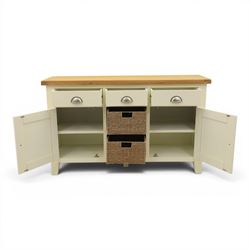 Contemporary white painted sideboard, oak veneered top above three drawers with metal cup handles, two central rattan drawers flanked by cupboards