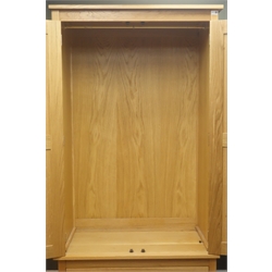  Oak double wardrobe, two panelled doors enclosing fitted interior above single drawer, stile supports, W100cm, H192cm, D56cm  