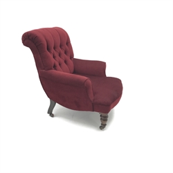  Victorian Howard style armchair, upholstered in a deep buttoned red fabric, turned supports, W83cm  