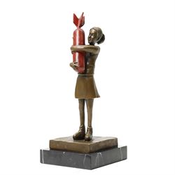 After Banksy - 'Bomb Love', bronze figure of a girl holding bomb, bearing signature, on ma...