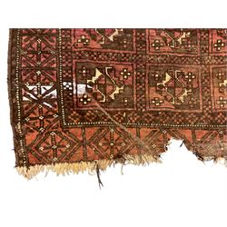 Afghan rug, the field decorated with rectangular panels with stylised plant motifs (165cm x 112cm), and a small Persian mat, red ground and decorated with Gul motifs (107cm x 48cm)