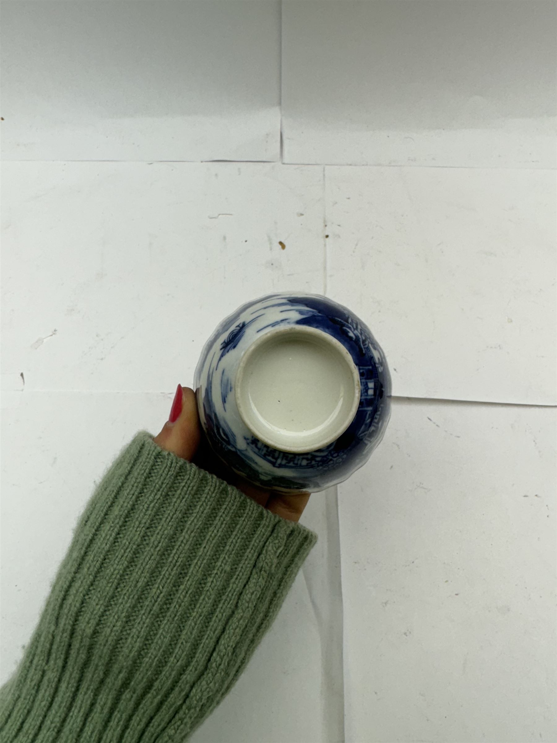 Pair of Staffordshire figures modelled as chained Dalmatians seated upon cobalt blue oval bases, H13cm, together with a Staffordshire pastille burner modelled as a castle, H12cm, a pair of 19th century Derby potpourri pots (lacking covers), and an 18th century blue and white tea bowl 