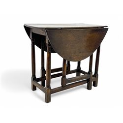 19th century oak gateleg table, the oval drop-leaf top formed of four planks, on turned co...