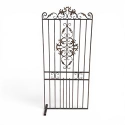 Victorian wrought iron vineyard gate, with ornate scrollwork and foliate acanthus leaf decoration, shaped cresting and central decorative panel, finished in rustic black painted finish