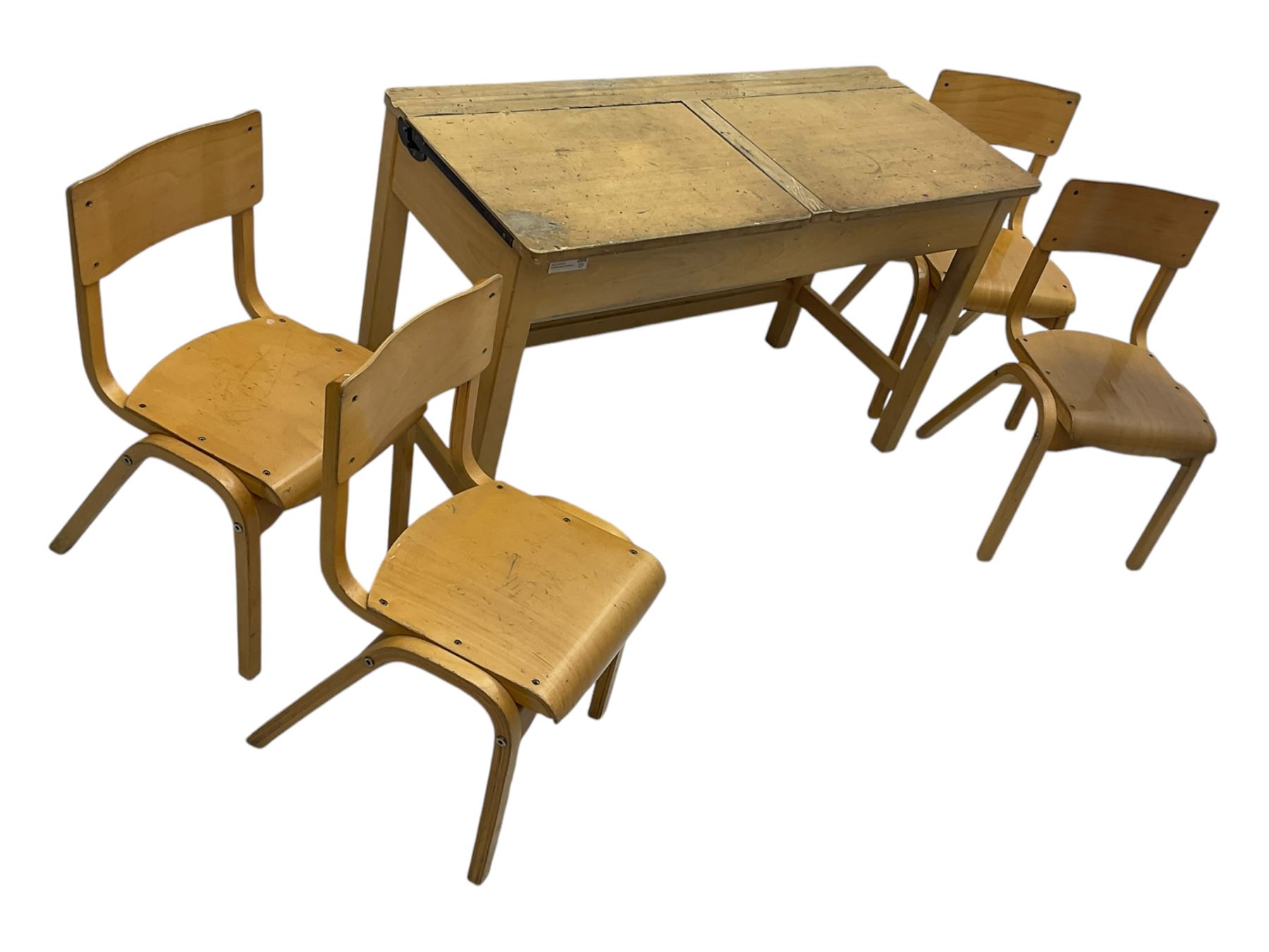 Mid-20th century beechwood school desk, rectangular lift-top desk with storage compartment, supported by square legs with cross stretchers; four matching beech chairs (5)
