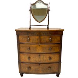 Victorian mahogany bow-front chest, fitted with two short and three long drawers (W103cm, H116cm, D51cm); together with a dressing table mirror (W48cm)