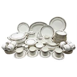 Royal Albert Paragon tea and dinner service for twelve decorated in the Belinda pattern, comprising fourteen saucers, twelve teacups, thirteen side plates, teapot, sauce boat and stand, salt and pepper shakers, two jugs, sucrier, twelve dinner plates, twelve smaller plates, two lidded tureens, twelve bowls, twelve smaller bowls, cake plate, oval plate and oval dish (100)