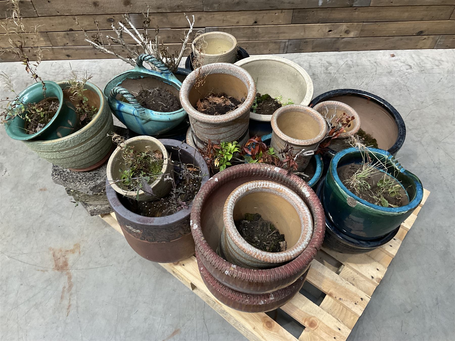 Large collection of ceramic plant pots and paving slabs, (26)
