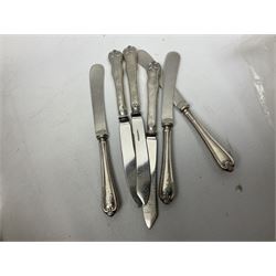 Six hallmarked silver handled knives, to include three Walker & Hall examples and three Charles William Fletcher & Son examples, quantity of silver-plated metalware to include Pinder Bros footed bowl with lion mask ring twin handles, Sheffield cutlery, tureen etc and other metalware to include copper dishes, cutlery, etc
