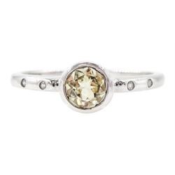 9ct white gold csarite and diamond ring, single round cut csarite with two rubover set dia...