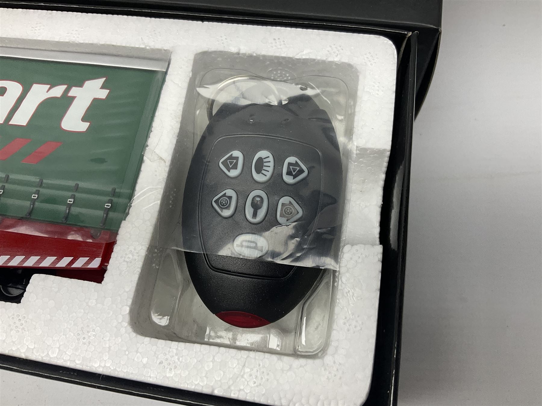 Corgi Eddie Stobart - three limited edition lorries; CC12936 Sight & Sounds Scania Topline Curtainside Trailer; CC13812 Hauliers of Renown Mercedes-Benz Actros Curtainside Knauf; and CC13405 MAN TGA XL Step Frame Curtainside Trailer; all boxed (3)