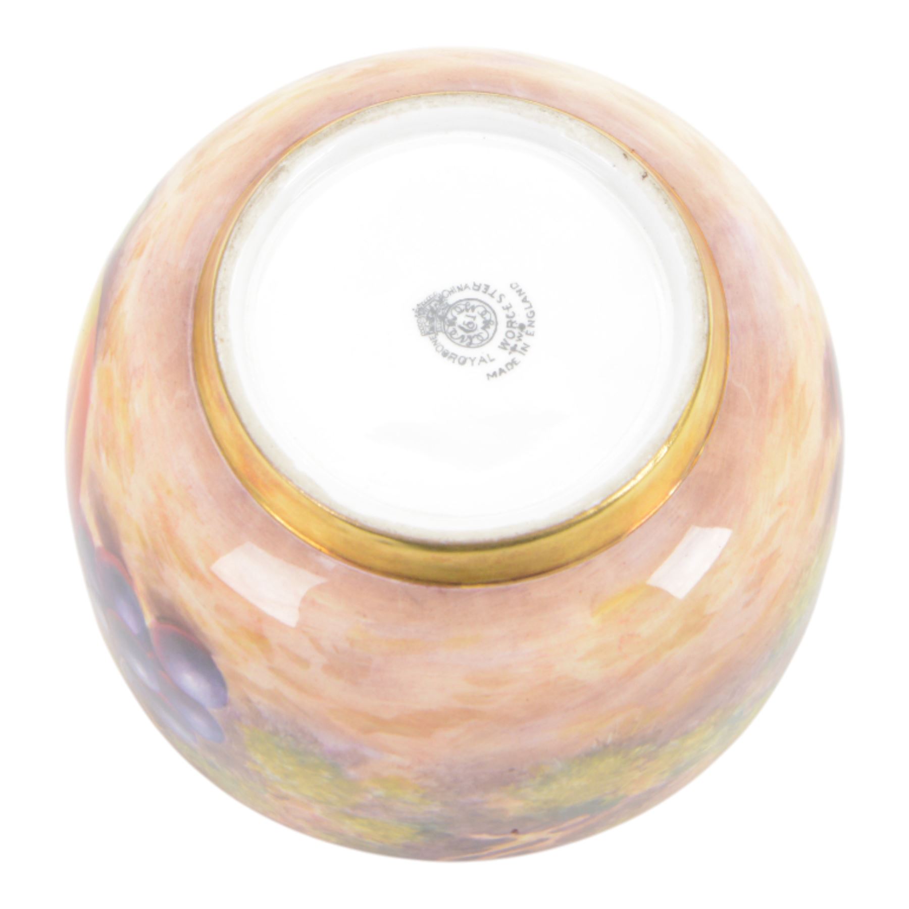 20th century Royal Worcester footed bowl, hand painted with gilt interior, the exterior a still life of fruit upon a mossy ground, signed Freeman, with black printed mark beneath, together with plate side plate and cabinet plate, bowl, H8cm, D13cm