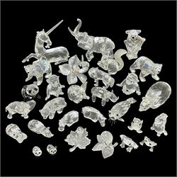 Twenty nine Swarovski Crystal animals, to include koala and baby, in frosted tree branch, elephants, polar bears, squirrel, monkeys, panda, unicorn and snails, etc 