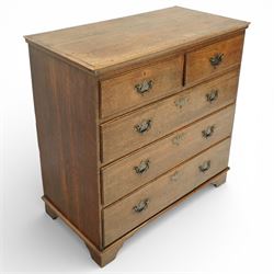 George III oak chest of drawers, the plain moulded top above a two over three drawer arrangement with pierced brass fittings, the case raised on bracket feet