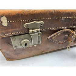 Early 20th century leather suitcase marked to the top 'Major P.M. Newton R.E. Crossways, Bridlington, East Yorkshire' 60 x 40cm; another similar leather suitcase marked W.D. to the lid; three post-WW2 respirators; and three unopened pairs of British Army N.B.C. (Nuclear Biological Chemical) No.1 Mk.III Trousers Protective (8)