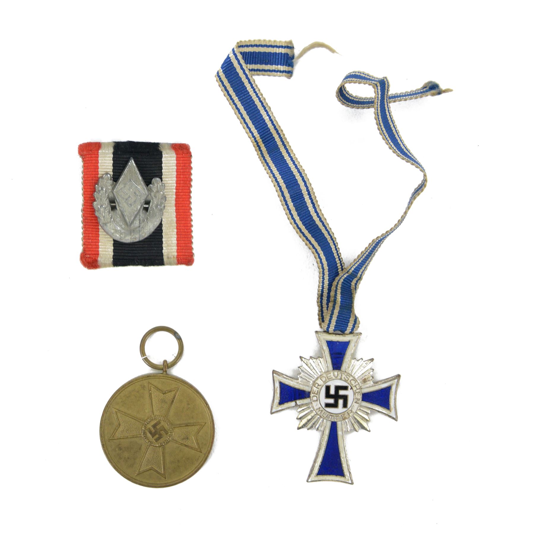 German Cross Of Honour Of The German Mother silver with ribbon, together with War Merit Medal 'fur kriegs verdien 1939' and Hitler youth badge