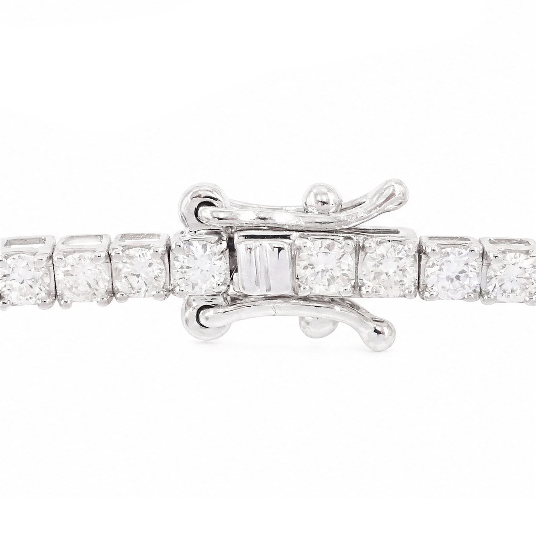 18ct white gold diamond bracelet, four claw set with seventy-three round brilliant cut diamonds, stamped, total diamond weight approx 2.50 carat