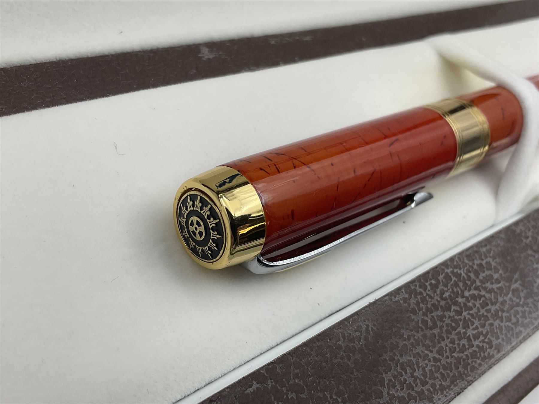 Circa 1930s Mentmore Auto Flow button fill fountain pen, the black barrel and cap with single narrow band and gold nib stamped Osmi Ridium 14ct, together with two gold nib fountain pens, each marked Huahong, the first stamped 14K 580, and second stamped 8K, both housed in Mentmore boxes (3)