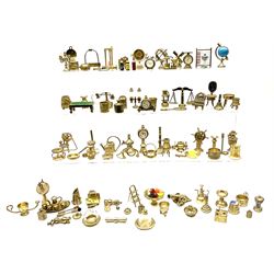 Over one-hundred various scale miniature brass ornaments suitable for decorating doll's houses including assorted lamps, fire-side tools and accessories, clocks, pans, scales, bottle holder, abacus, grand piano, ship's binnacle, wheel and telegraph, hour glass, miner's lamp etc