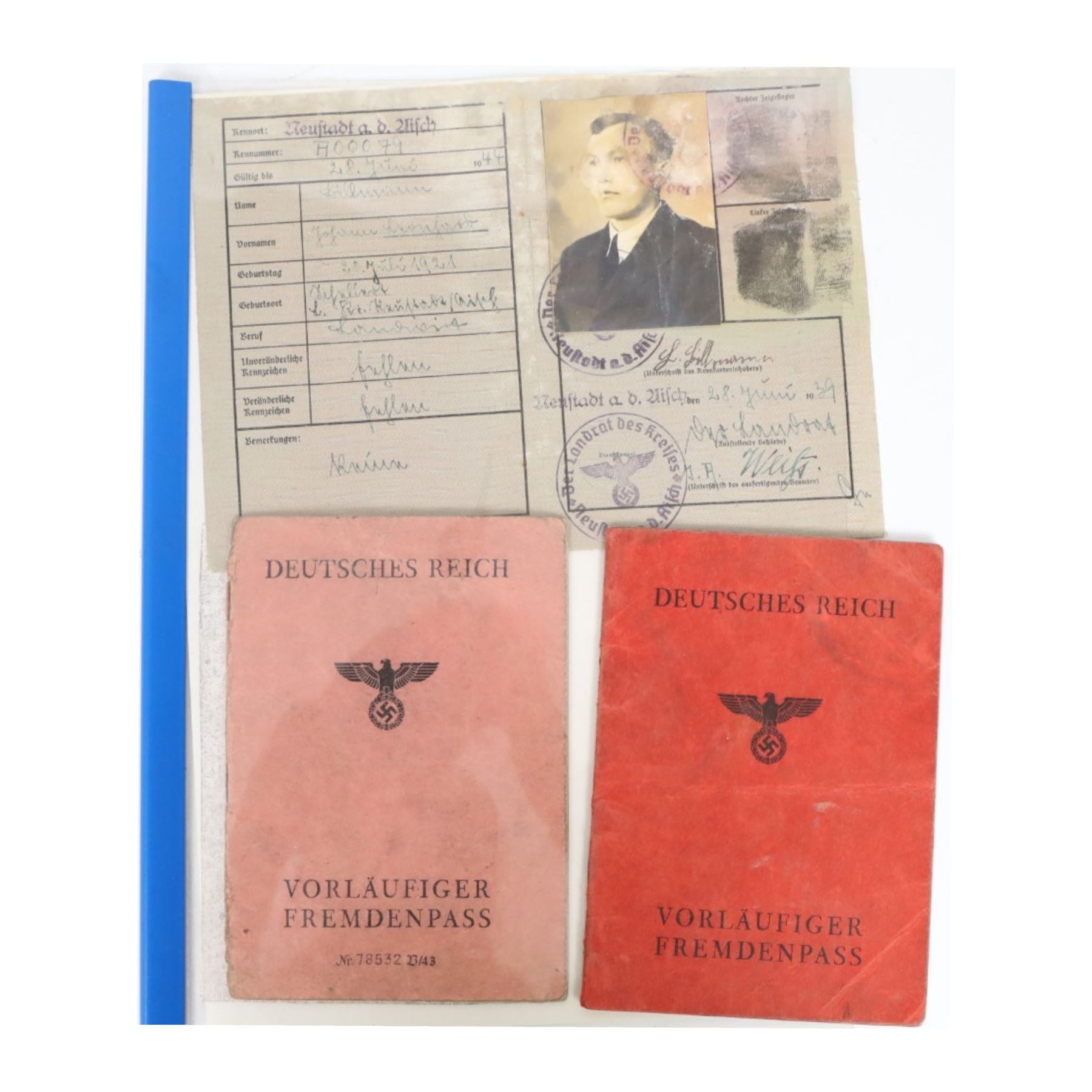WWII Third Reich ephemera, including Army passes, provisional foreigner's passports, reports etc 