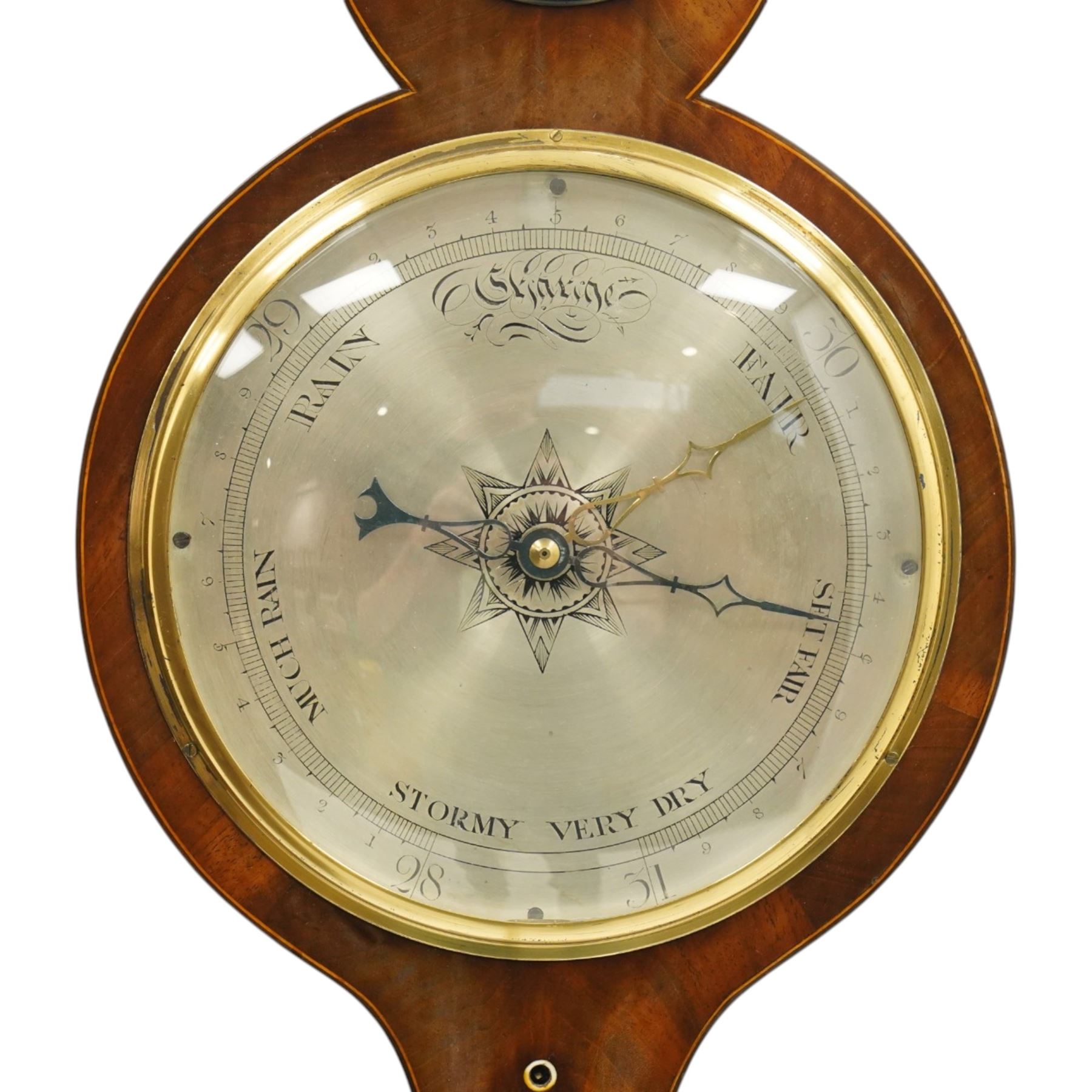 Late 18th century mahogany wheel barometer, swan neck pediment over silvered hygrometer dial and convex mirror, the large silvered register signed by York maker, with spirit level below, the case with boxwood stringing and brass bezels