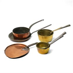 Four Victorian brass saucepans, largest 17cm, copper saucepan 19cm, copper pan and lid