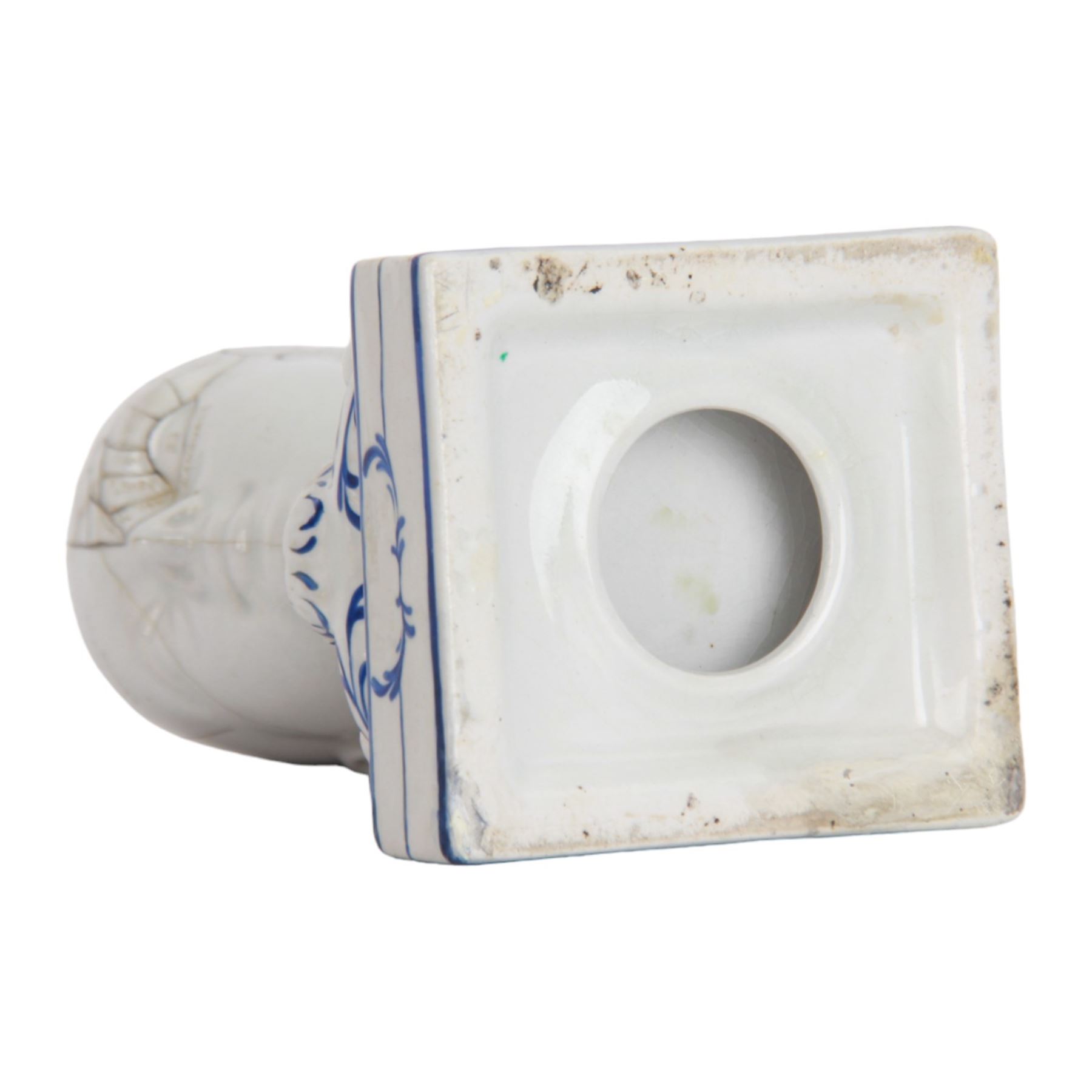 19th century Staffordshire pottery Phrenology head inkwell, circa 1860, the head mapped out, upon a scrolling base with pen/ink recesses and rectangular plinth impressed 'By F. Bridges Phrenologist', H14cm