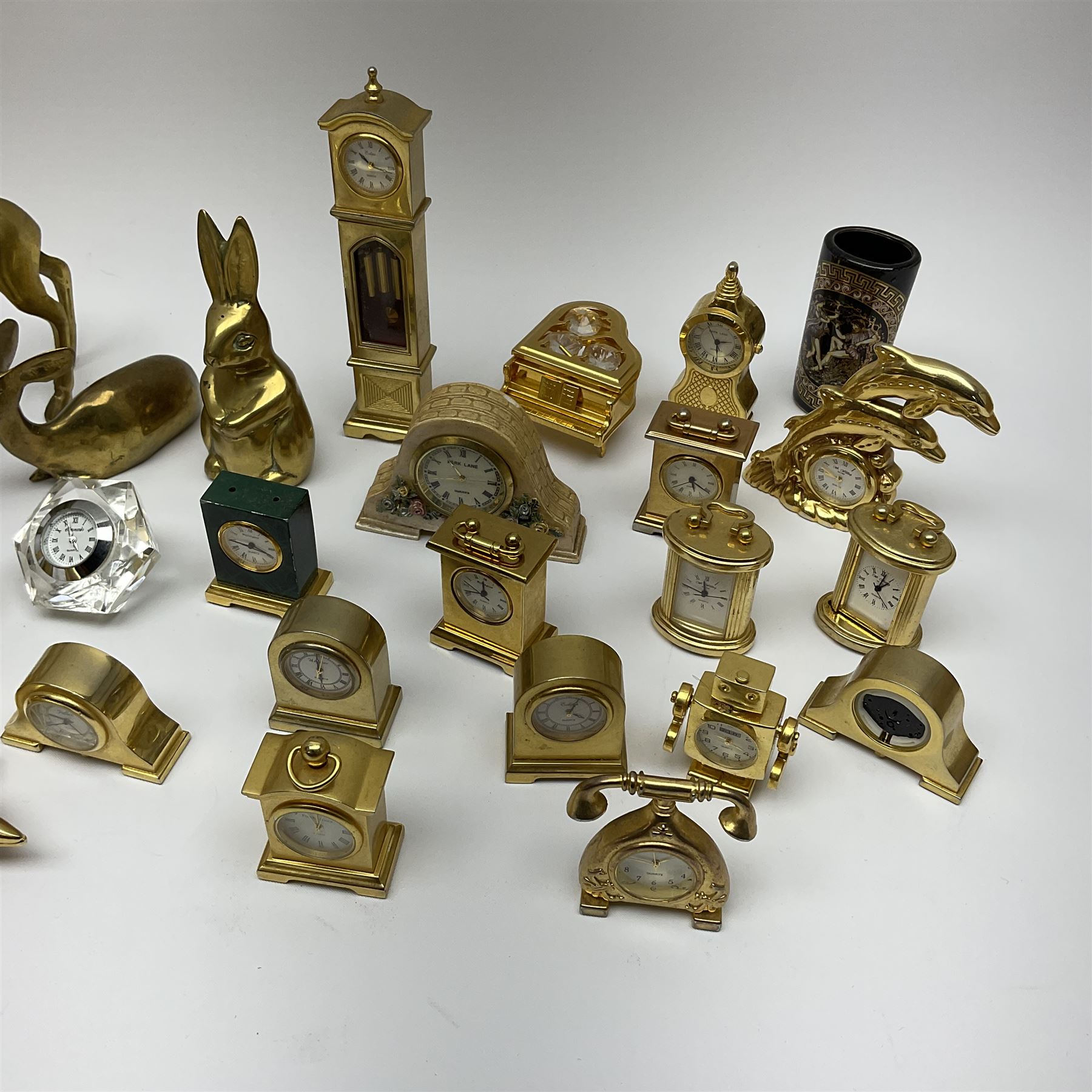 Collection of brass miniature clocks to include examples modelled as