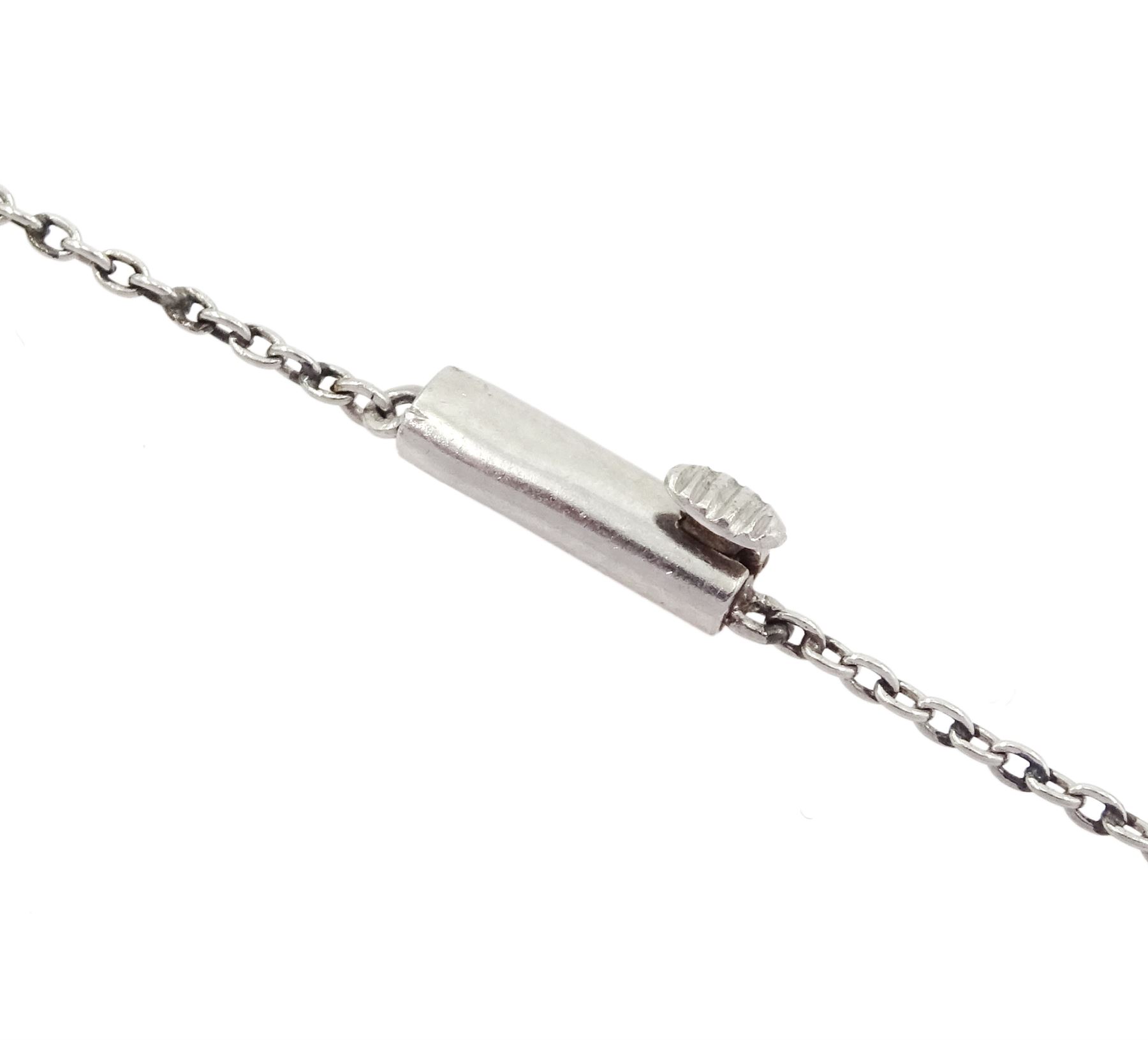 Art Deco platinum milgrain set diamond, emerald and sapphire flower basket pendant necklace, the basket set with old cut diamonds, calibre cut sapphires and emeralds, diamonds approx 2.00 carat, suspending a single pear cut diamond of approx 2.05 carat, on a platinum trace link chain necklace, stamped Plat, circa 1915-1920, in fitted box by Licht & Morrison, London