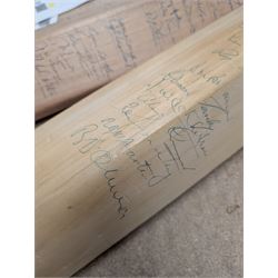 Two signed cricket bats, with signatures including Colin Cowdrey