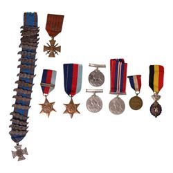 WWII British medals, comprising three war medals and  two 1939-45 Star, together with comm...