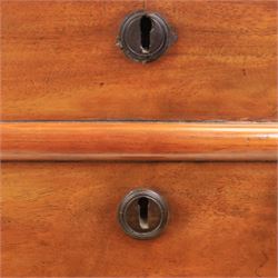 Victorian mahogany chest, with four long  flame mahogany fronted drawers with turned wooden knobs, raised on turned bun feet 