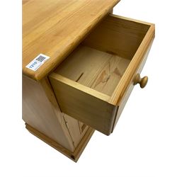 Pair traditional pine bedside cabinets, single drawer over cupboard